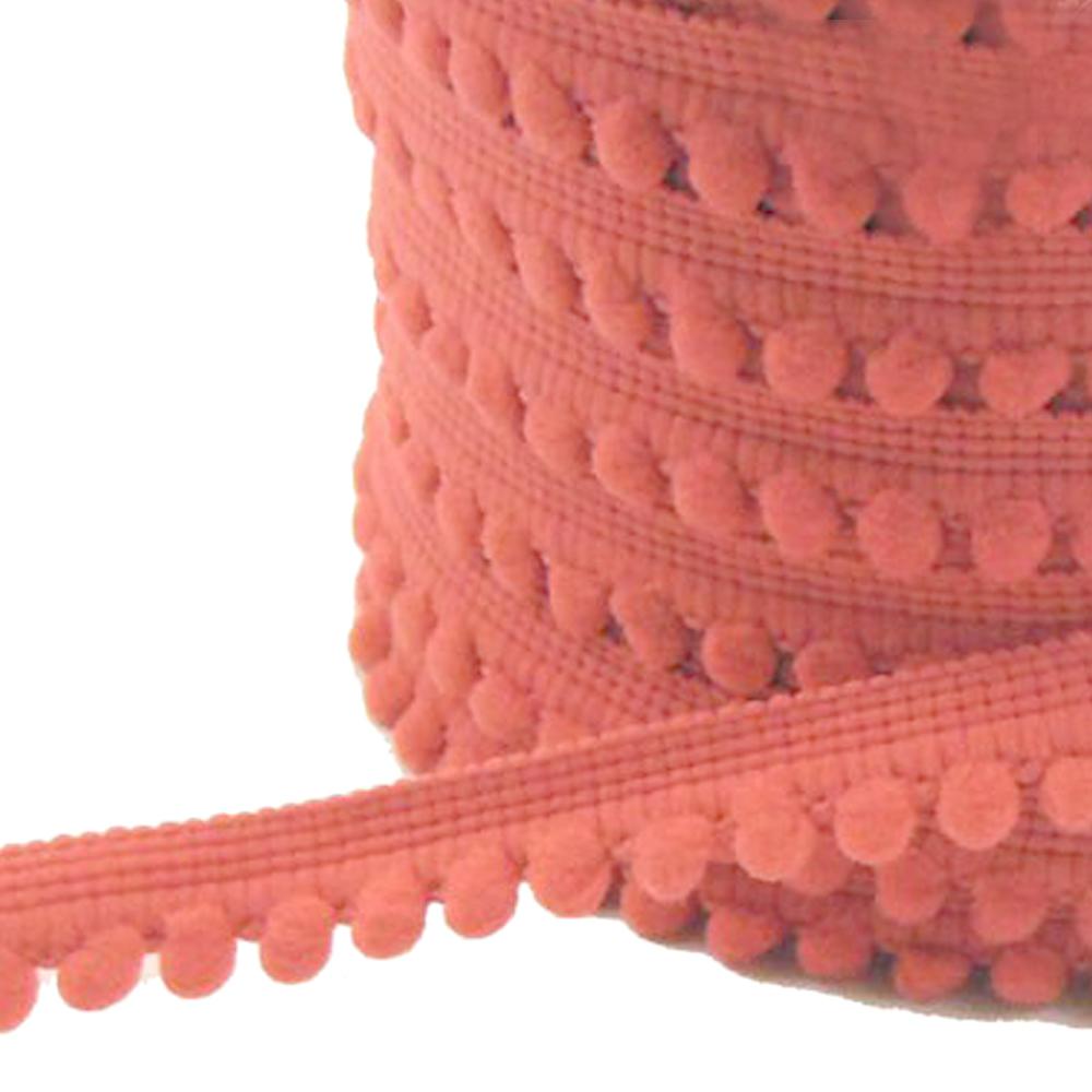 Galon pompons petits 1,2cm corail Galon pompons petits 1,2cm corail